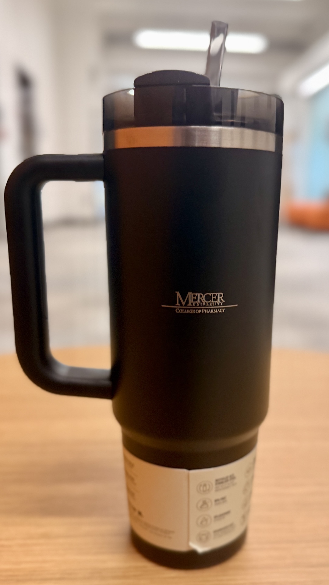 a photo of a stanley tumbler with the college of pharmacy logo