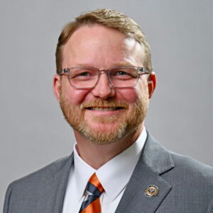 Official portrait headshot of Dr. Michael A. Crouch, Dean