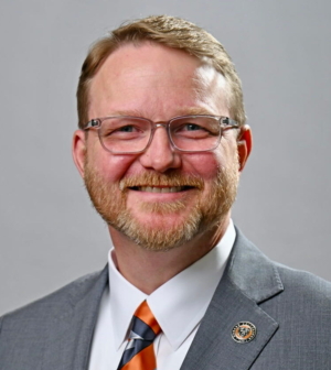 Official portrait headshot of Dr. Michael A. Crouch, Dean