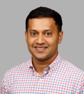 A headshot of Dr. Hasan